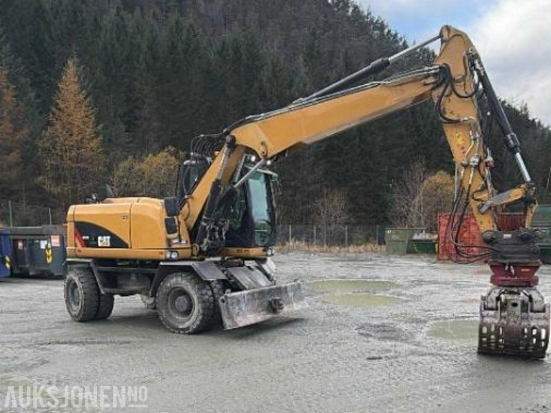 2013 Cat M313D med skjær kun 9.700 arbeidstimer! Indexator Rototilt, NY SERTIFISERT!, NYE DEKK! GRAVESKUFFE + PUSSESKUFFE TOP STAND! - Escavadeira: foto 2 2013 Cat M313D med skjær kun 9.700 arbeidstimer! Indexator Rototilt, NY SERTIFISERT!, NYE DEKK! GRAVESKUFFE + PUSSESKUFFE TOP STAND! - Escavadeira: foto 2