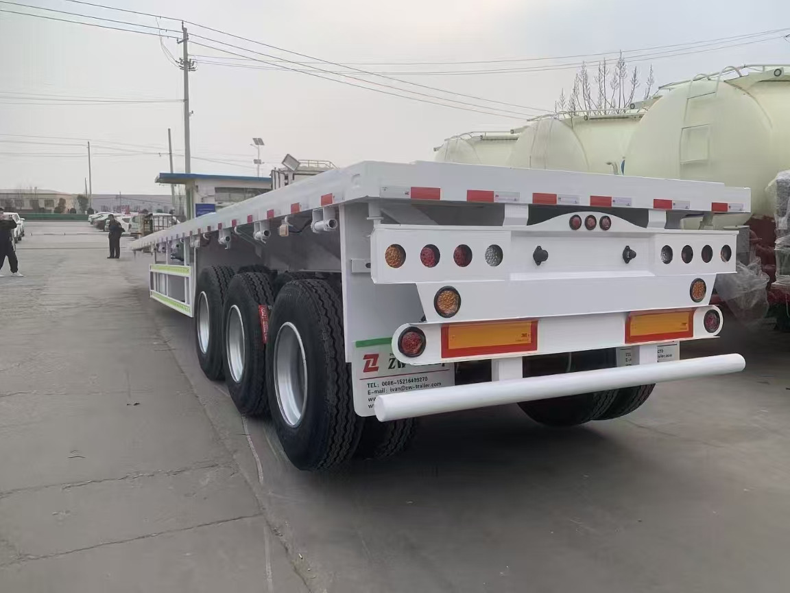 ZHICHENG Semi Flat Bed Low Bed in New or Used with 3 Axles 4 Axles - Semi-reboque baixa: foto 4 ZHICHENG Semi Flat Bed Low Bed in New or Used with 3 Axles 4 Axles - Semi-reboque baixa: foto 4