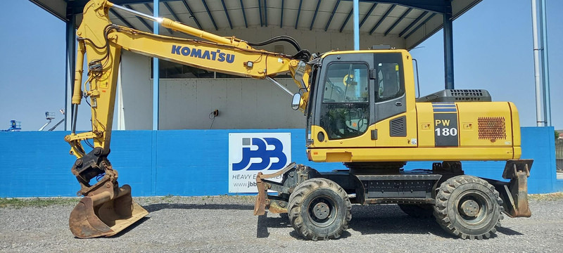 Komatsu PW180-7EO - Escavadeira de rodas: foto 1 Komatsu PW180-7EO - Escavadeira de rodas: foto 1
