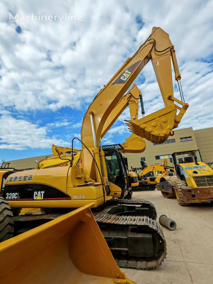 Caterpillar 320CL - Escavadeira de rodas: foto 3 Caterpillar 320CL - Escavadeira de rodas: foto 3