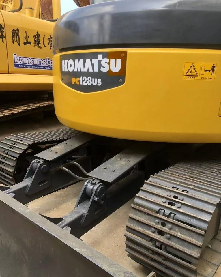 Komatsu 128 US - Escavadora de rastos: foto 2 Komatsu 128 US - Escavadora de rastos: foto 2