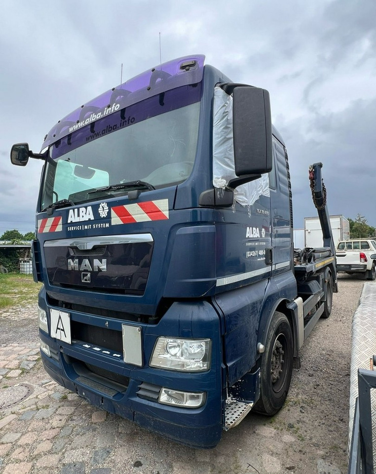 MAN Inny MAN Man TGX 18.400 Bramowiec hakowiec Meiler Model 2012 - Camião multibenne: foto 1 MAN Inny MAN Man TGX 18.400 Bramowiec hakowiec Meiler Model 2012 - Camião multibenne: foto 1