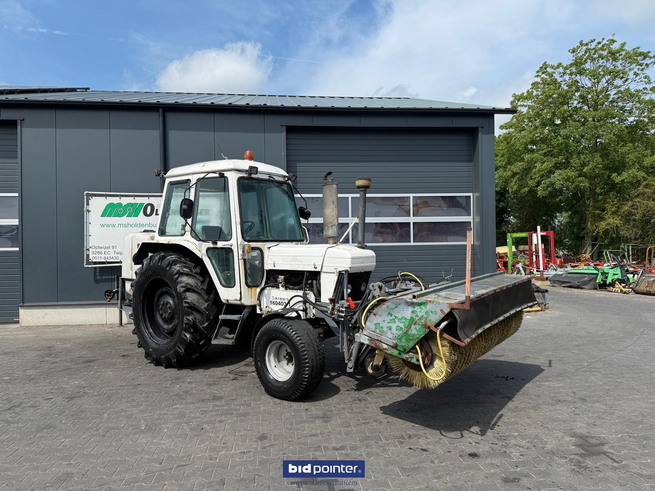 Ford 6610 met rolbezem - Trator: foto 1 Ford 6610 met rolbezem - Trator: foto 1