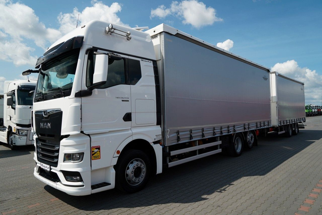 MAN TGX 26.470 / ZESTAW TANDEM 120 M3 / PRZEJAZDOWY - Camião de lona: foto 2 MAN TGX 26.470 / ZESTAW TANDEM 120 M3 / PRZEJAZDOWY - Camião de lona: foto 2