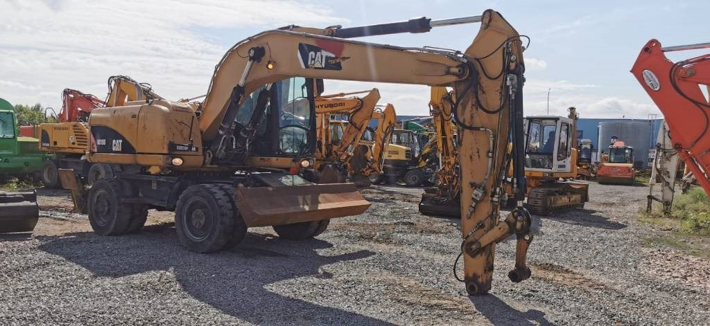 Escavadeira de rodas CAT M 315 D: foto 6
