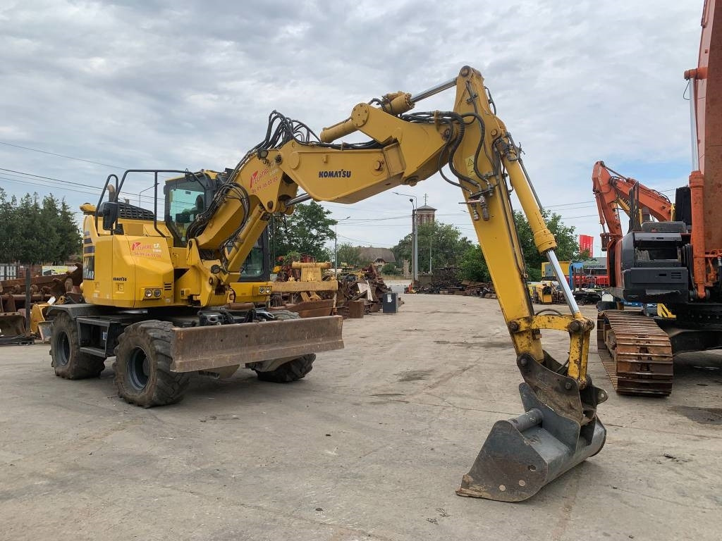 Komatsu PW118MR-11W - Escavadeira de rodas: foto 2 Komatsu PW118MR-11W - Escavadeira de rodas: foto 2