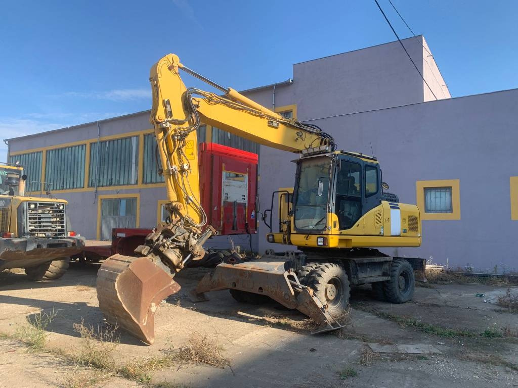 Komatsu PW180-E0+Engcon Rototilt  - Escavadeira de rodas: foto 1 Komatsu PW180-E0+Engcon Rototilt  - Escavadeira de rodas: foto 1