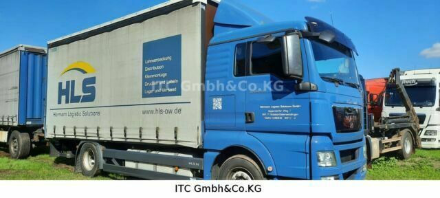 MAN TGX18.400 Pritsche Plane - Camião de lona: foto 1 MAN TGX18.400 Pritsche Plane - Camião de lona: foto 1