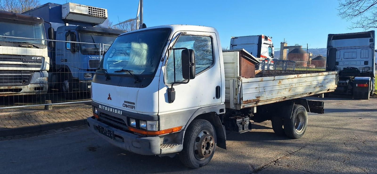 Mitsubishi Canter Kipper - Carrinha basculante: foto 1 Mitsubishi Canter Kipper - Carrinha basculante: foto 1