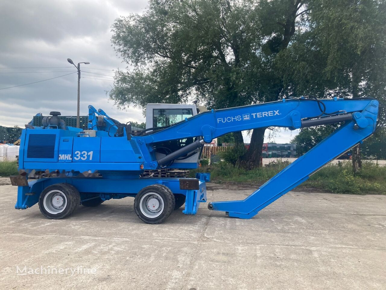 Manipulador de material Fuchs MHL 331 C with Generator: foto 10