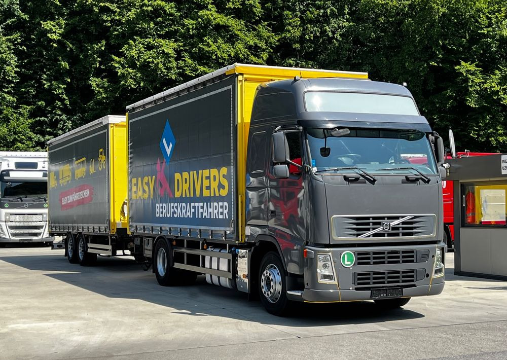 Volvo FH 420 4x2 // Zestaw + przyczepa Schwarzmuller // Jak Nowy // Niski przebieg // Automat // Idealny !!! - Camião de lona: foto 1 Volvo FH 420 4x2 // Zestaw + przyczepa Schwarzmuller // Jak Nowy // Niski przebieg // Automat // Idealny !!! - Camião de lona: foto 1