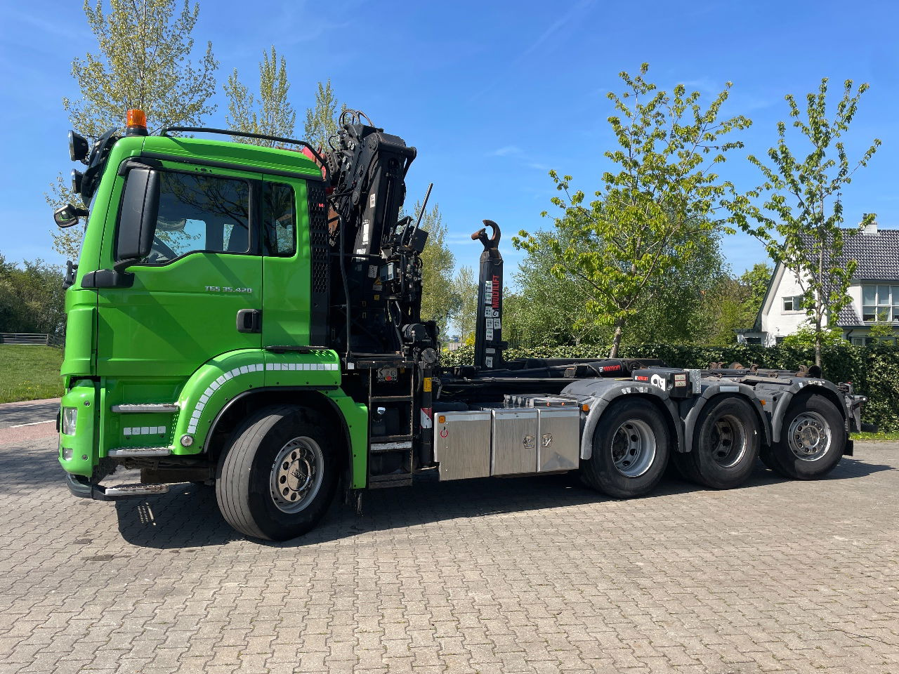 MAN TGS 35.420 met hiab 19tm Z kraan en 26t haakarm, bouwjaar 2018 - Camião transportador de contêineres/ Caixa móvel, Camião grua: foto 1 MAN TGS 35.420 met hiab 19tm Z kraan en 26t haakarm, bouwjaar 2018 - Camião transportador de contêineres/ Caixa móvel, Camião grua: foto 1