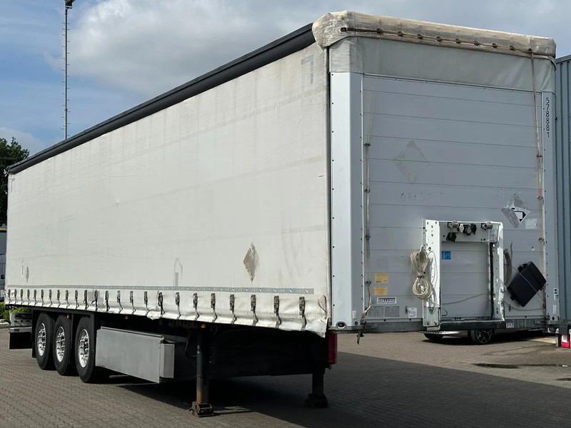 Schmitz Cargobull Schuifzeil met Coil / Schuifdak / Rotos-Disc - Semi-reboque de lona: foto 4 Schmitz Cargobull Schuifzeil met Coil / Schuifdak / Rotos-Disc - Semi-reboque de lona: foto 4