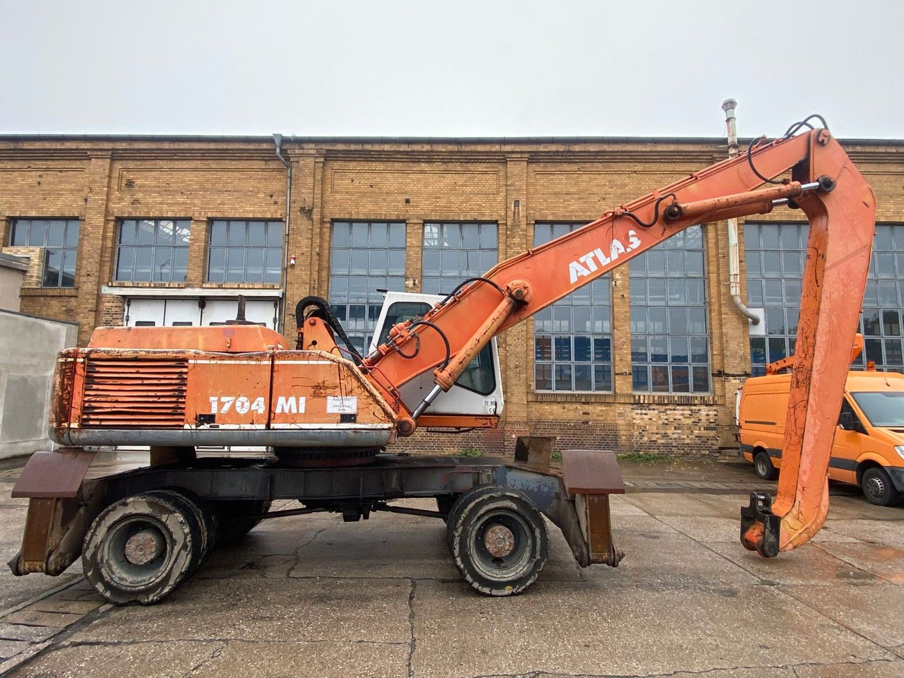 Atlas 1704 MI mit Greifer Umschlagbagger Lang - Escavadeira de rodas: foto 2 Atlas 1704 MI mit Greifer Umschlagbagger Lang - Escavadeira de rodas: foto 2