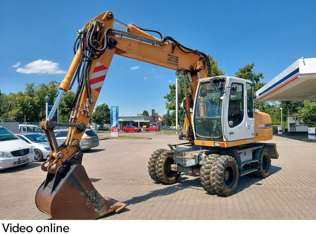 Liebherr A 316 LITRONIC TL + 2005 DEUTZ 13400 STD. - Escavadeira de rodas: foto 1 Liebherr A 316 LITRONIC TL + 2005 DEUTZ 13400 STD. - Escavadeira de rodas: foto 1