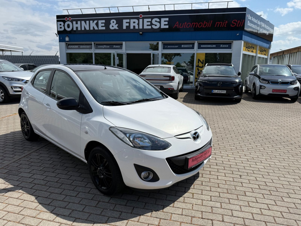 Mazda 2 Lim. 1.3 Origami 5 TÜER KLIMA SHZ TÜV NEU - Automóvel: foto 1 Mazda 2 Lim. 1.3 Origami 5 TÜER KLIMA SHZ TÜV NEU - Automóvel: foto 1