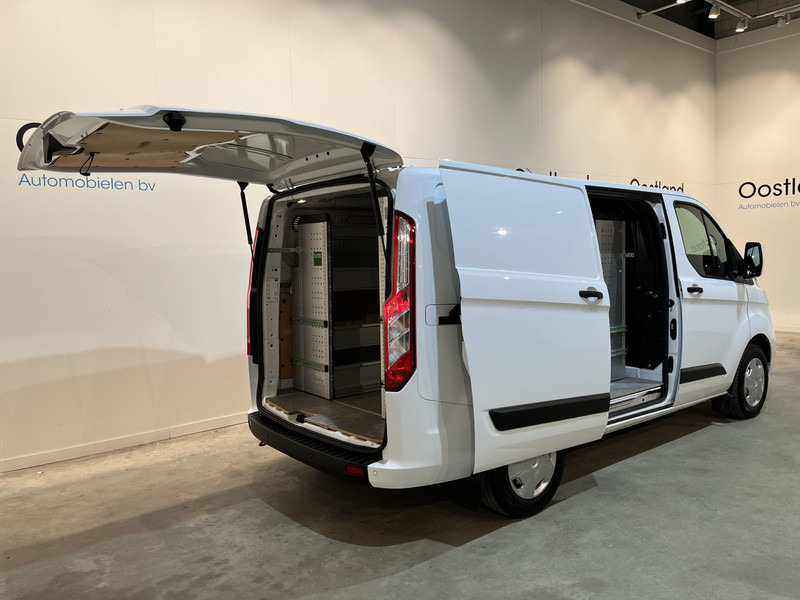 Ford Transit Custom 300 2.0 TDCI L1H1 Trend 130 PK / Servicebus / Bott Inrichting / Euro 6 / Schuifdeur L + R / Airco / CarPlay / Klep / PDC / Navigatie / 3-Zits / BPM VRIJ !! - Furgão compacto: foto 2 Ford Transit Custom 300 2.0 TDCI L1H1 Trend 130 PK / Servicebus / Bott Inrichting / Euro 6 / Schuifdeur L + R / Airco / CarPlay / Klep / PDC / Navigatie / 3-Zits / BPM VRIJ !! - Furgão compacto: foto 2