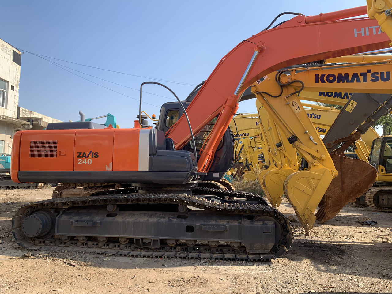 HITACHI ZAXIS240 - Escavadeira de rodas: foto 1 HITACHI ZAXIS240 - Escavadeira de rodas: foto 1
