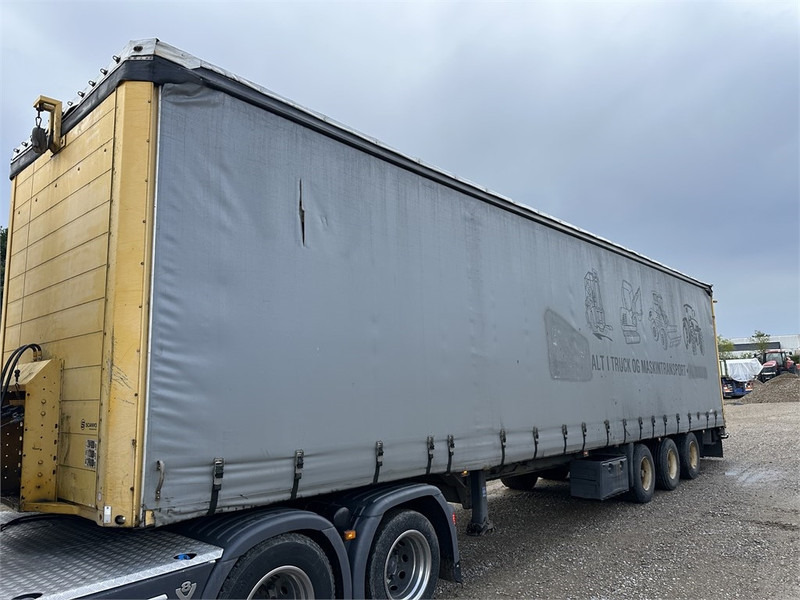Schmitz Cargobull Machine transport trailer with bag ramp - Semi-reboque baixa: foto 4 Schmitz Cargobull Machine transport trailer with bag ramp - Semi-reboque baixa: foto 4