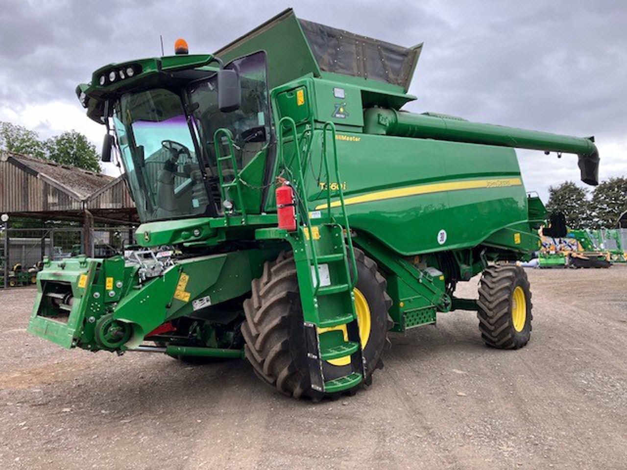 John Deere T560i HillMaster - Ceifeira debulhadora: foto 1 John Deere T560i HillMaster - Ceifeira debulhadora: foto 1