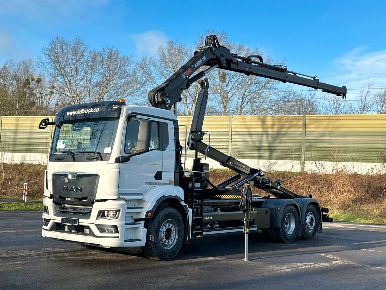 MAN TGS 26.470 6x2 Abrollkipper + Kran Hiab 138-3 - Camião polibenne, Camião grua: foto 2 MAN TGS 26.470 6x2 Abrollkipper + Kran Hiab 138-3 - Camião polibenne, Camião grua: foto 2