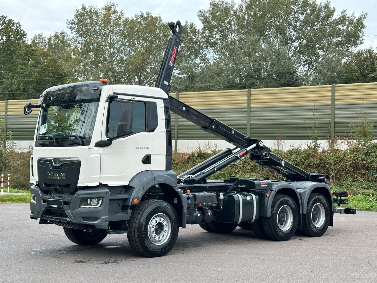 MAN TGS 33.440 6x4 Euro6e MultiLift 21S59 - Camião polibenne, Camião grua: foto 1 MAN TGS 33.440 6x4 Euro6e MultiLift 21S59 - Camião polibenne, Camião grua: foto 1