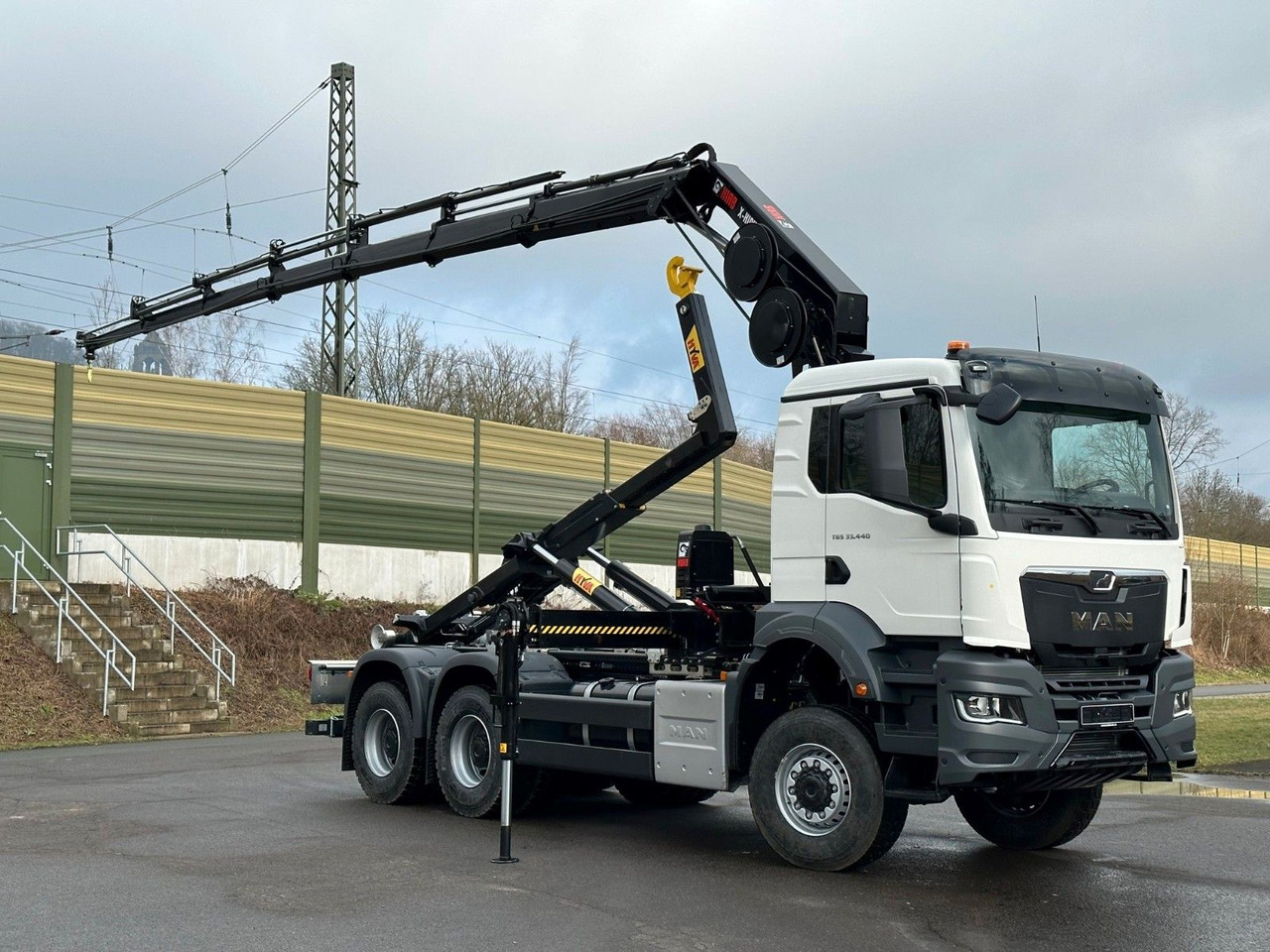 MAN TGS 33.440 6x6 BB Abrollkipper+Kran Hiab 228-6 - Camião polibenne, Camião grua: foto 3 MAN TGS 33.440 6x6 BB Abrollkipper+Kran Hiab 228-6 - Camião polibenne, Camião grua: foto 3
