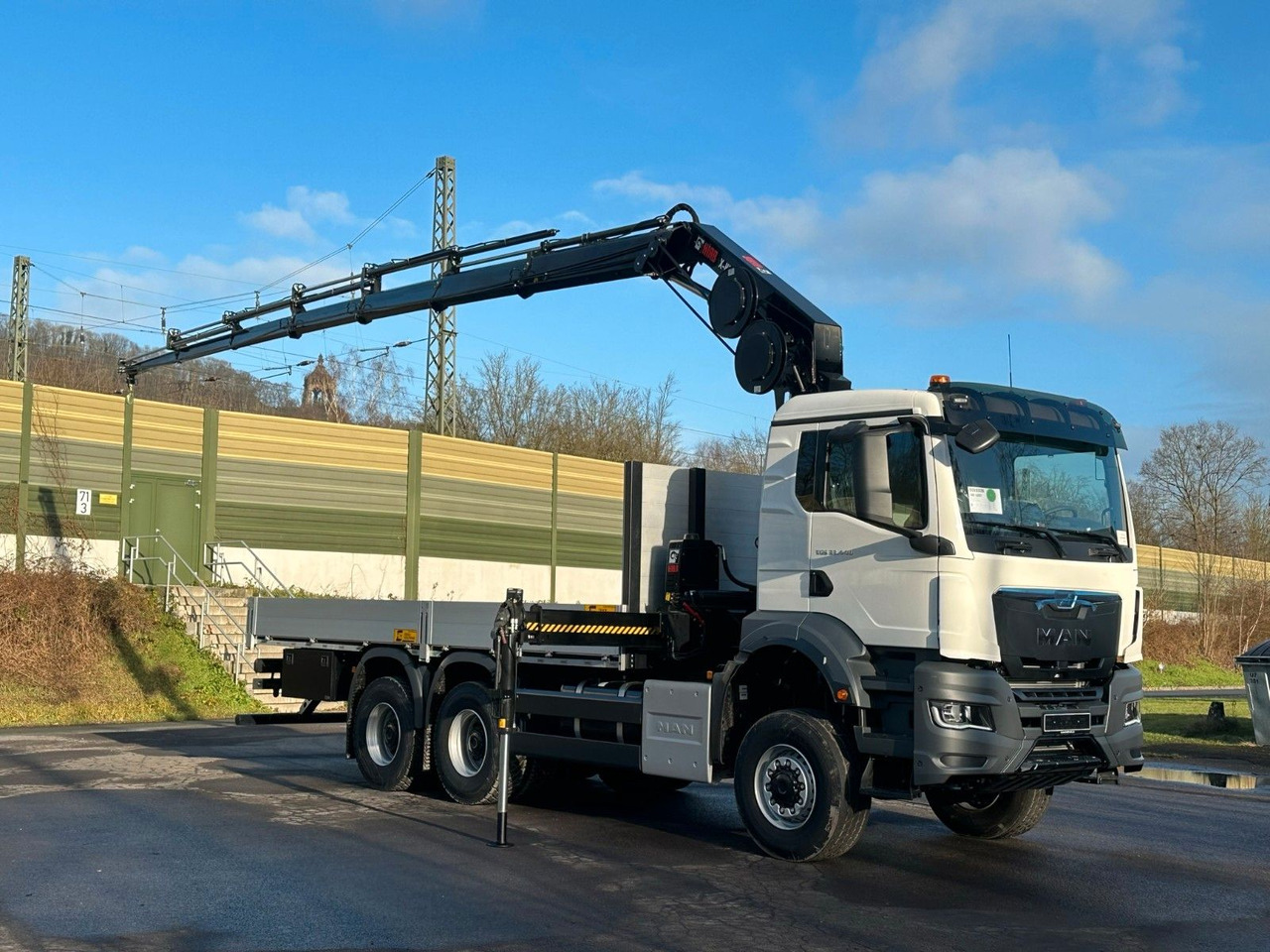 MAN TGS 33.440 6x6 Kran HIAB 228-6 - Camião grua: foto 1 MAN TGS 33.440 6x6 Kran HIAB 228-6 - Camião grua: foto 1