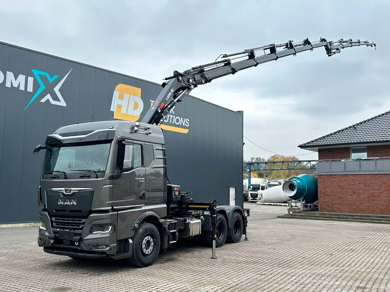 MAN TGX 26.580 6x4 Kran Hiab 302-6 + Jib-4 - Camião grua: foto 2 MAN TGX 26.580 6x4 Kran Hiab 302-6 + Jib-4 - Camião grua: foto 2