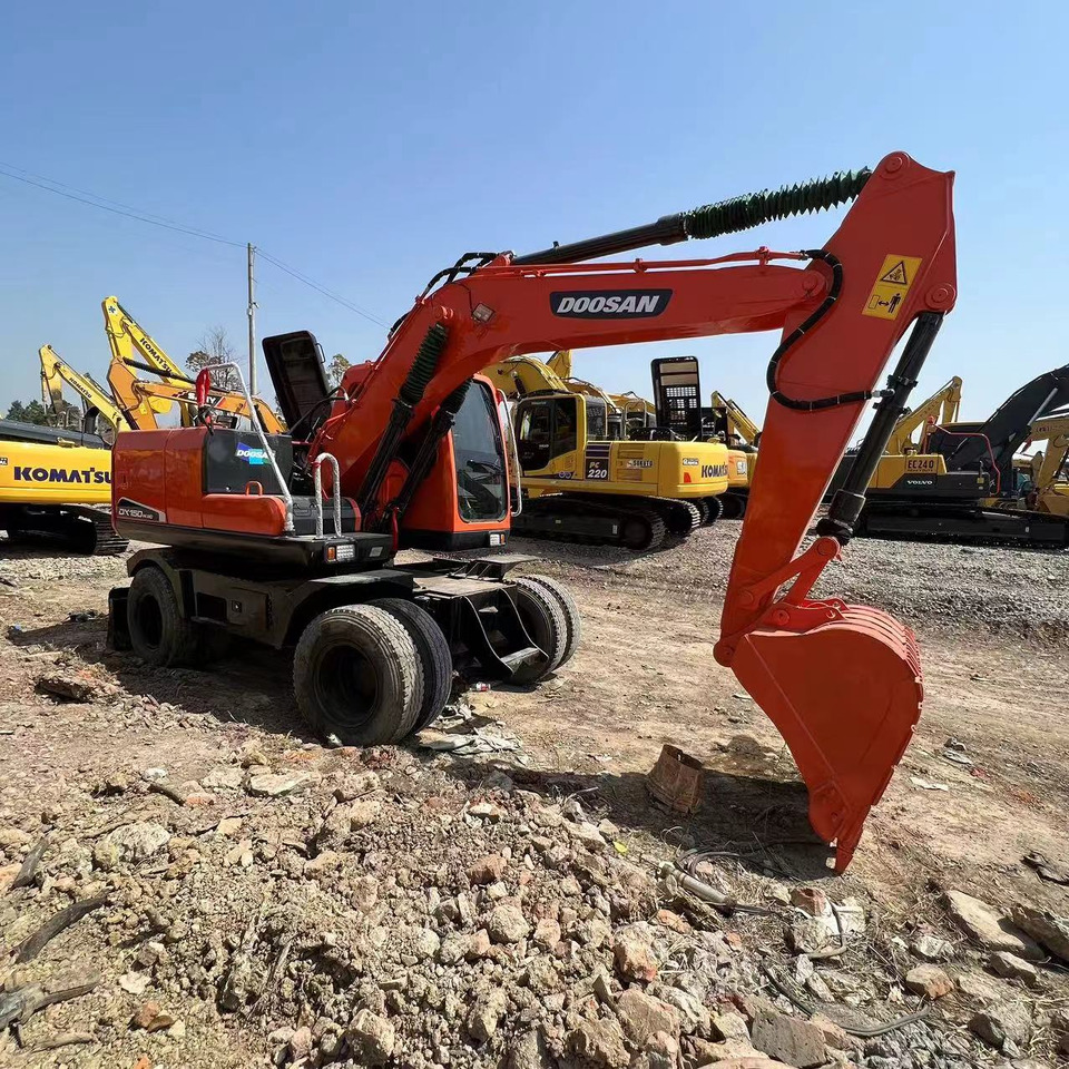 DOOSAN DH150W-7 - Escavadeira de rodas: foto 1 DOOSAN DH150W-7 - Escavadeira de rodas: foto 1