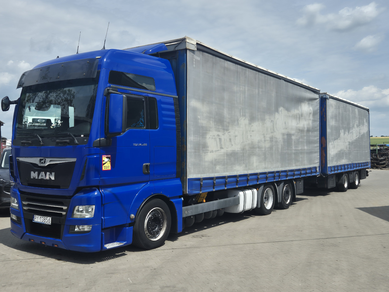 MAN tgx 24,500 - Camião de lona: foto 2 MAN tgx 24,500 - Camião de lona: foto 2