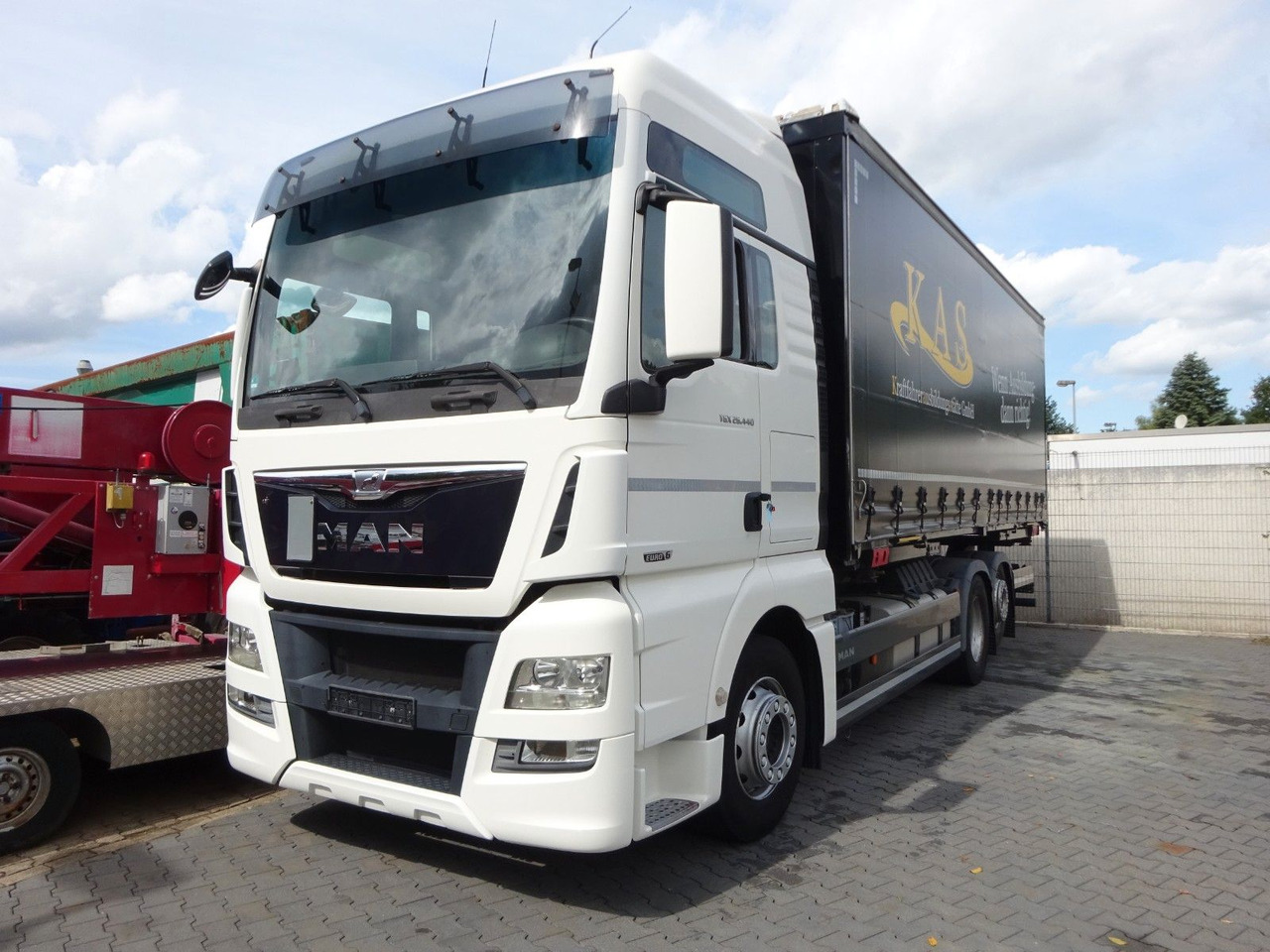 MAN 26.440 TGX BDF Wechselsystem 6x2 - Camião transportador de contêineres/ Caixa móvel: foto 1 MAN 26.440 TGX BDF Wechselsystem 6x2 - Camião transportador de contêineres/ Caixa móvel: foto 1