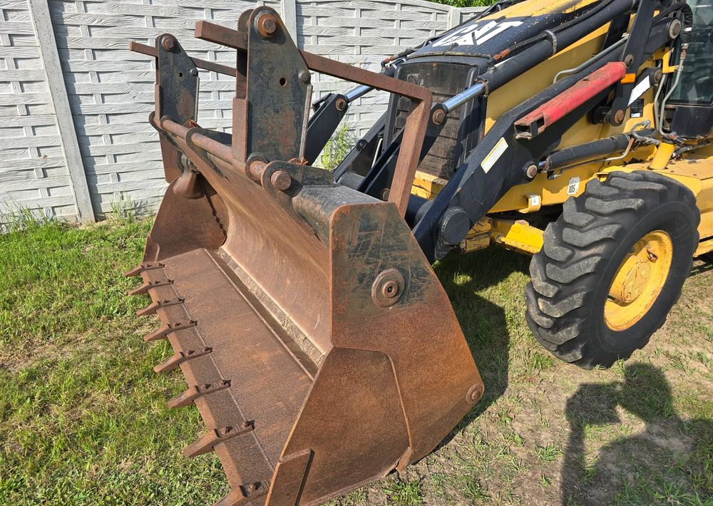 Retroescavadeira Caterpillar: foto 8