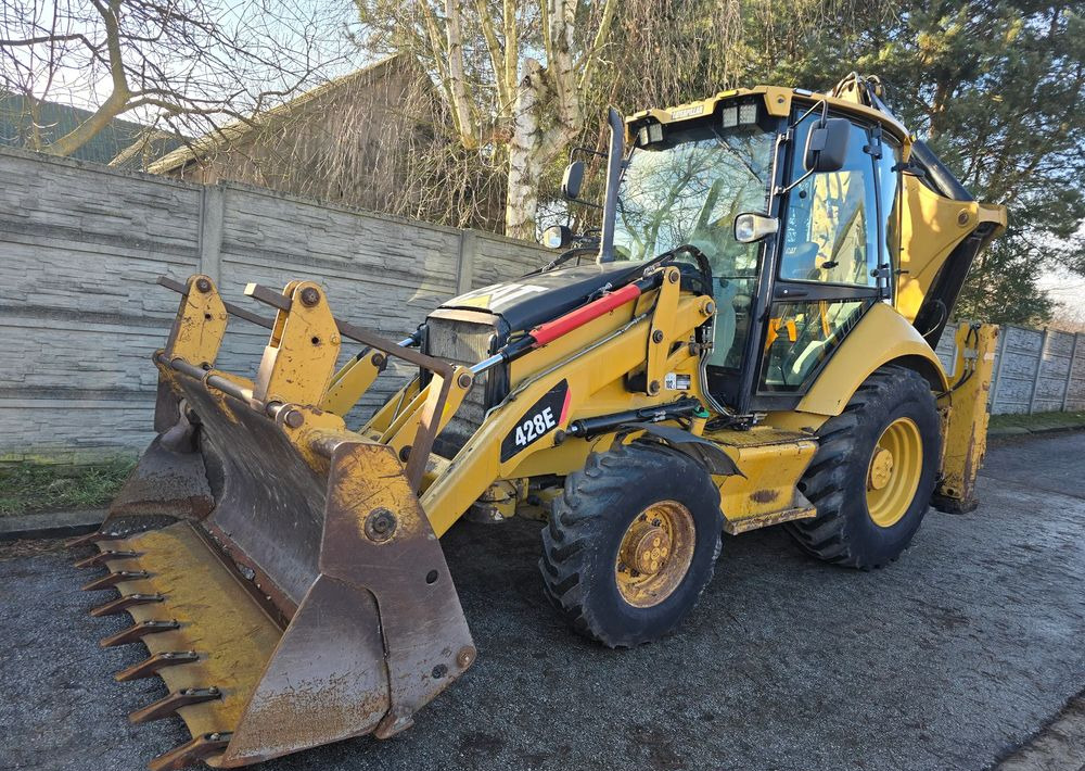 Caterpillar - Retroescavadeira: foto 1 Caterpillar - Retroescavadeira: foto 1