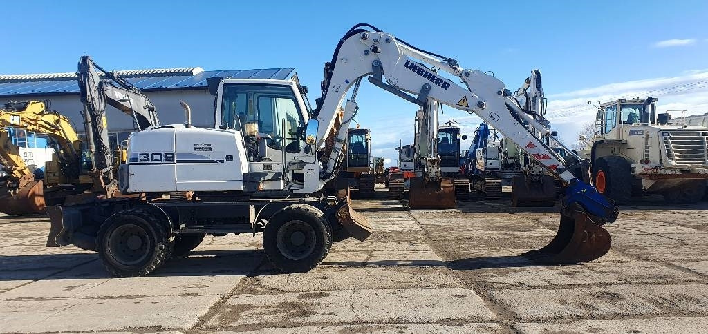 Liebherr A 309 Litronic - Escavadeira de rodas: foto 4 Liebherr A 309 Litronic - Escavadeira de rodas: foto 4