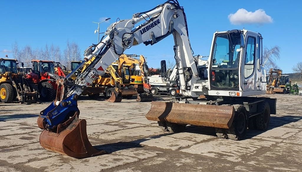 Liebherr A 309 Litronic - Escavadeira de rodas: foto 1 Liebherr A 309 Litronic - Escavadeira de rodas: foto 1