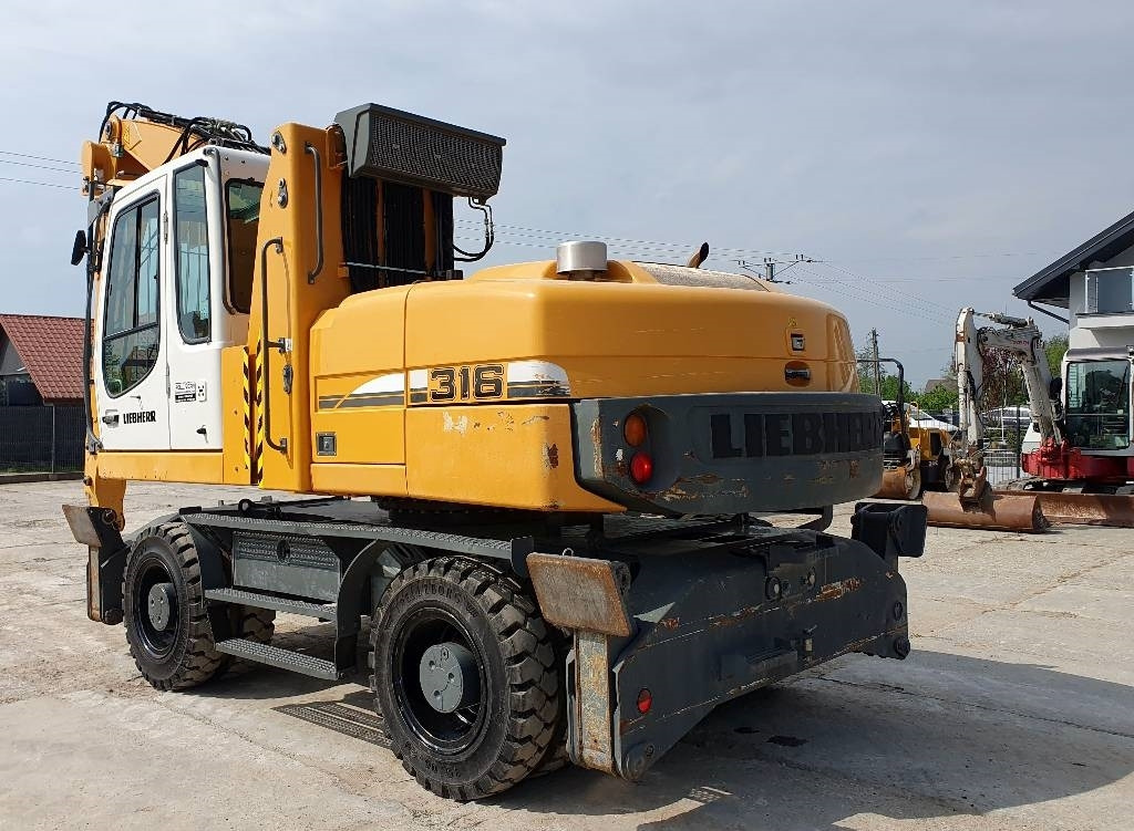 Liebherr A 316 Litronic - Manipulador de material: foto 2 Liebherr A 316 Litronic - Manipulador de material: foto 2