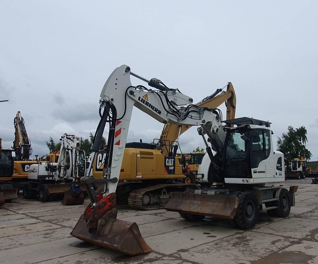 Liebherr A 914 Compact - Escavadeira de rodas: foto 1 Liebherr A 914 Compact - Escavadeira de rodas: foto 1