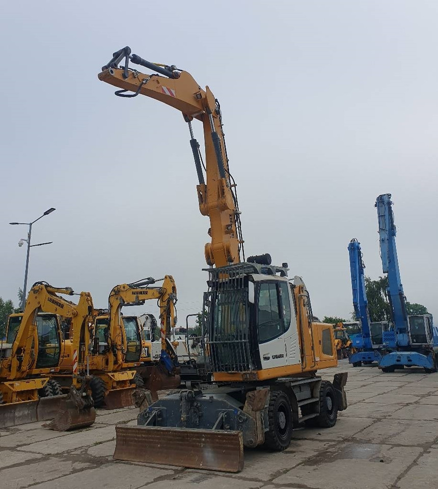 Liebherr LH 22 M - Manipulador de material: foto 1 Liebherr LH 22 M - Manipulador de material: foto 1