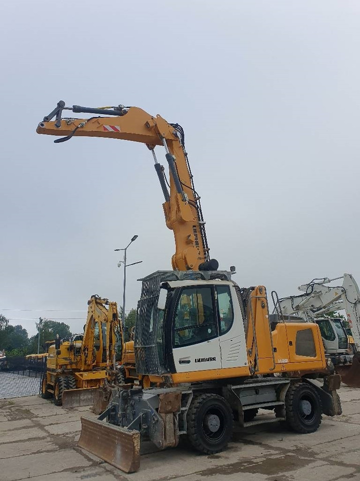 Liebherr LH 22 M - Manipulador de material: foto 2 Liebherr LH 22 M - Manipulador de material: foto 2