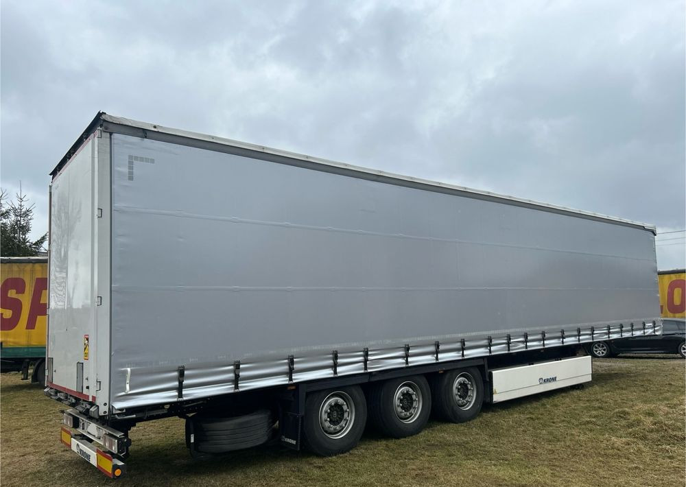 Krone STANDARD 2021 podnoszona oś OPONY 70% / STAN BARDZO DOBRY / OD PIERWSZEGO WŁAŚCICIELA / PALECIARA / TOP / sprowadzona z Niemiec !! - Semi-reboque de lona: foto 2 Krone STANDARD 2021 podnoszona oś OPONY 70% / STAN BARDZO DOBRY / OD PIERWSZEGO WŁAŚCICIELA / PALECIARA / TOP / sprowadzona z Niemiec !! - Semi-reboque de lona: foto 2
