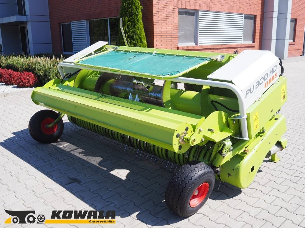 Claas PICK UP 300 HD - Picadora de forragem automotriz: foto 1 Claas PICK UP 300 HD - Picadora de forragem automotriz: foto 1