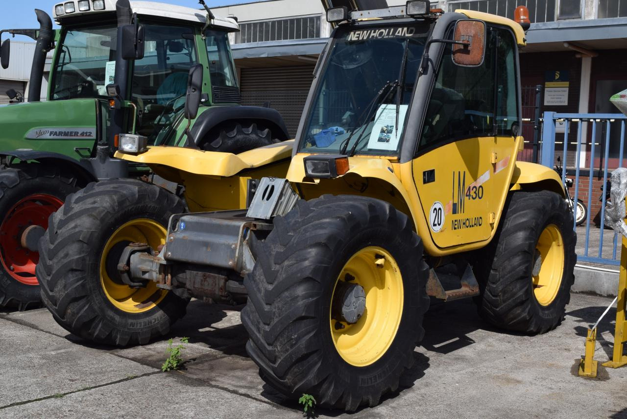 New Holland LM 430 - Empilhador telescópico: foto 1 New Holland LM 430 - Empilhador telescópico: foto 1