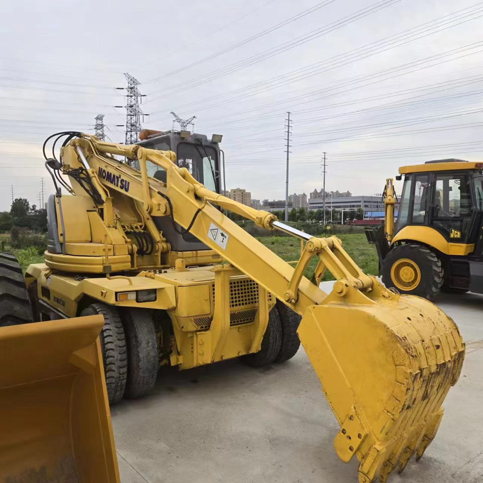 Escavadeira de rodas KOMATSU PC128US: foto 7