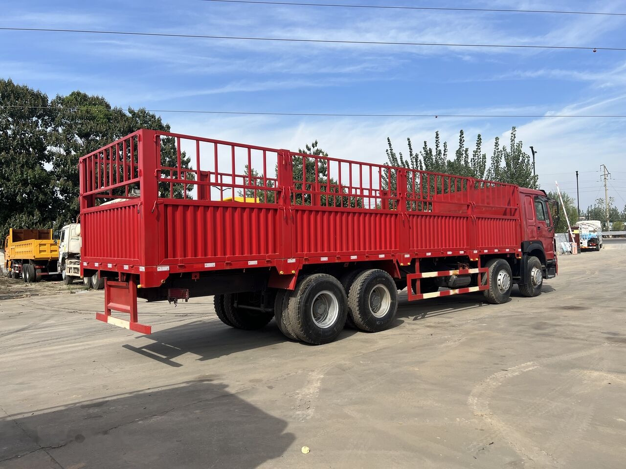 Sinotruk Howo Howo 8*4 - Camião de caixa aberta/ Plataforma: foto 1 Sinotruk Howo Howo 8*4 - Camião de caixa aberta/ Plataforma: foto 1