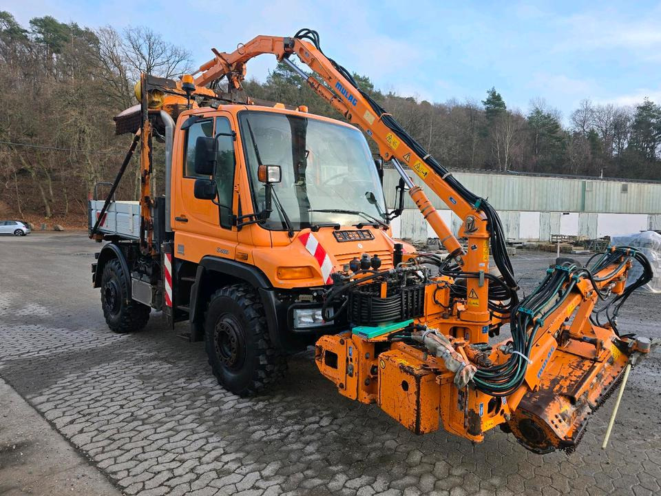 Unimog U400 2013 405/10 405/12 NKS-Z-UGN-43K Bluetec 5 Mercedes-Benz UGE UGN Mulag MKM700 Mähausleger Böschungsmäher Böschungsmulcher Küpper-Weisser IMS Salzstreuer - Veículo municipal/ Especial: foto 5 Unimog U400 2013 405/10 405/12 NKS-Z-UGN-43K Bluetec 5 Mercedes-Benz UGE UGN Mulag MKM700 Mähausleger Böschungsmäher Böschungsmulcher Küpper-Weisser IMS Salzstreuer - Veículo municipal/ Especial: foto 5