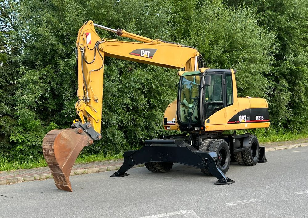 Caterpillar CAT M315C CATERPILLAR SPROWADZONY Bardzo Dobry Stan - Escavadeira de rodas: foto 1 Caterpillar CAT M315C CATERPILLAR SPROWADZONY Bardzo Dobry Stan - Escavadeira de rodas: foto 1