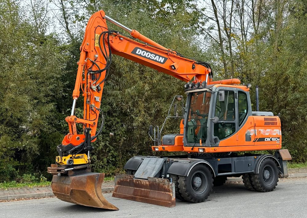 Doosan * DOOSAN DX160W *ROTOTILT* GPS 2D Leica * Sprowadzona * Stan Perfekcyjny * Koparka Kołowa * - Escavadeira de rodas: foto 1 Doosan * DOOSAN DX160W *ROTOTILT* GPS 2D Leica * Sprowadzona * Stan Perfekcyjny * Koparka Kołowa * - Escavadeira de rodas: foto 1