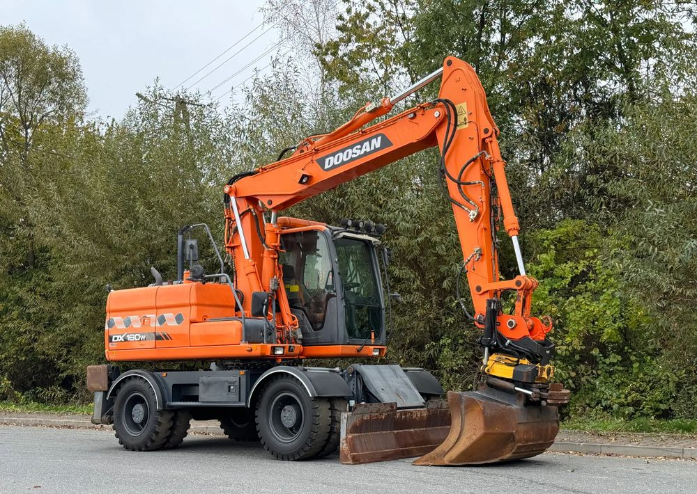 Doosan * DOOSAN DX160W *ROTOTILT* GPS 2D Leica * Sprowadzona * Stan Perfekcyjny * Koparka Kołowa * - Escavadeira de rodas: foto 2 Doosan * DOOSAN DX160W *ROTOTILT* GPS 2D Leica * Sprowadzona * Stan Perfekcyjny * Koparka Kołowa * - Escavadeira de rodas: foto 2