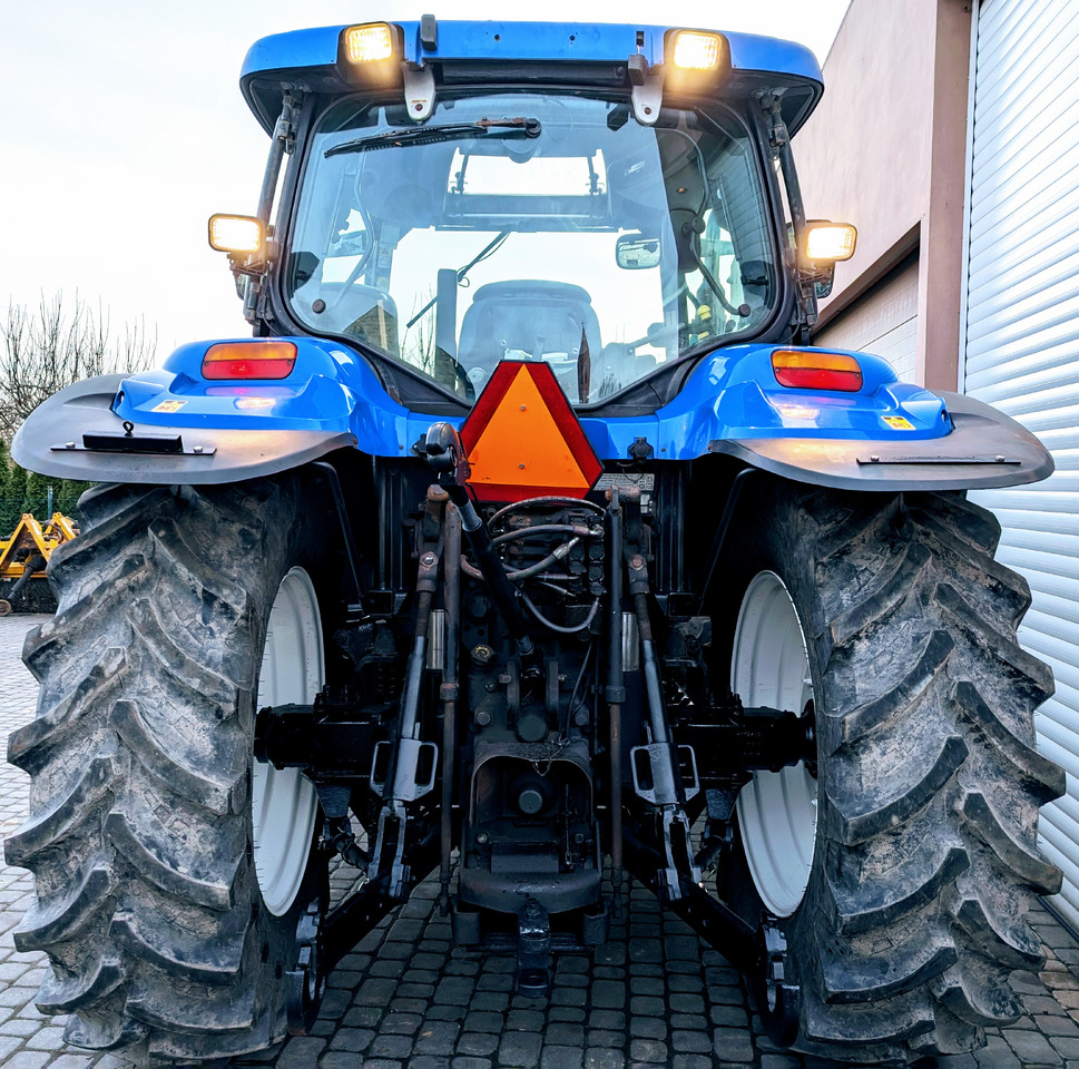 New Holland TS115A - Trator: foto 2 New Holland TS115A - Trator: foto 2